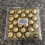 Box of Ferrero Rocher chocolates in gold wrappers