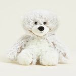 White plush teddy bear with black eyes and nose
