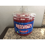 A large plastic jar of Red Vines original red licorice twists