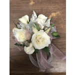 Small bouquet of white roses with pink ribbon and silver accents