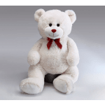 White teddy bear with a red bow sitting on a gray background