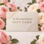Gift card surrounded by pink and cream roses