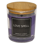Purple candle in a glass jar with a wooden lid