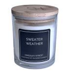 Glass jar candle with a wooden lid and dark label