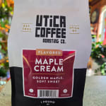 Bag of Utica Coffee maple cream coffee beans on a counter