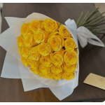 Bouquet of yellow roses wrapped in white paper