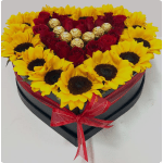 Heart-shaped box of red roses and yellow sunflowers with chocolates