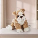 Plush bulldog toy sitting on a table