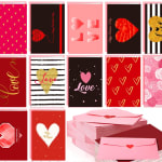 Assorted pink and red heart-themed greeting cards and envelopes.
