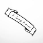 Black-and-white ribbon graphic with the words "In Loving Memory"