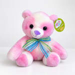 Pink and white plush teddy bear with a striped ribbon bow