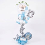 Birthday balloon arrangement with a silver 13 and blue-white balloons