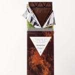 Wrapped dark chocolate bar with a geometric design and label