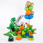 Dinosaur-themed balloon arrangement with a large silver number 4 and colorful balloons