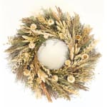 Dried floral wreath with beige and gold tones