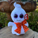 White ghost plush with purple eyes and an orange polka-dot bow