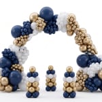 Blue, white, and gold balloon arch with matching balloon columns