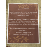Printed donation flyer on a woven surface asking to sponsor a resident.