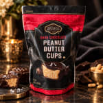 Bag of dark chocolate peanut butter cups on a table