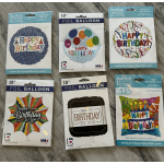 Six packaged birthday foil balloons with colorful printed designs