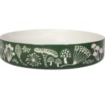 Green ceramic bowl with white mushroom illustrations