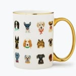 White mug with gold handle and dog illustrations