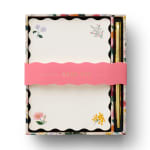 Floral notepad and gold pen in a pink gift box