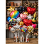 Assorted birthday balloons in glass vases, including heart and star shapes