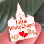 Pin reading "a Little White Chapel" with red hearts