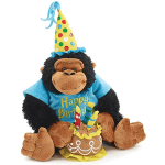 Birthday gorilla plush wearing a party hat and shirt, sitting with a plush cake and candles
