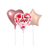 Three heart and star-shaped balloons, including one that says I Love You.
