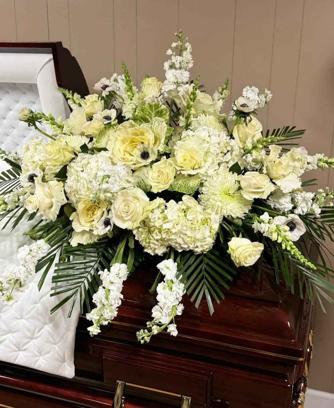 Garden of Peace - White roses, white carnations, white hydrangeas, stock and greenery.