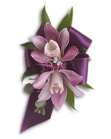 Purple orchid corsage with rhinestones on a deep purple satin ribbon