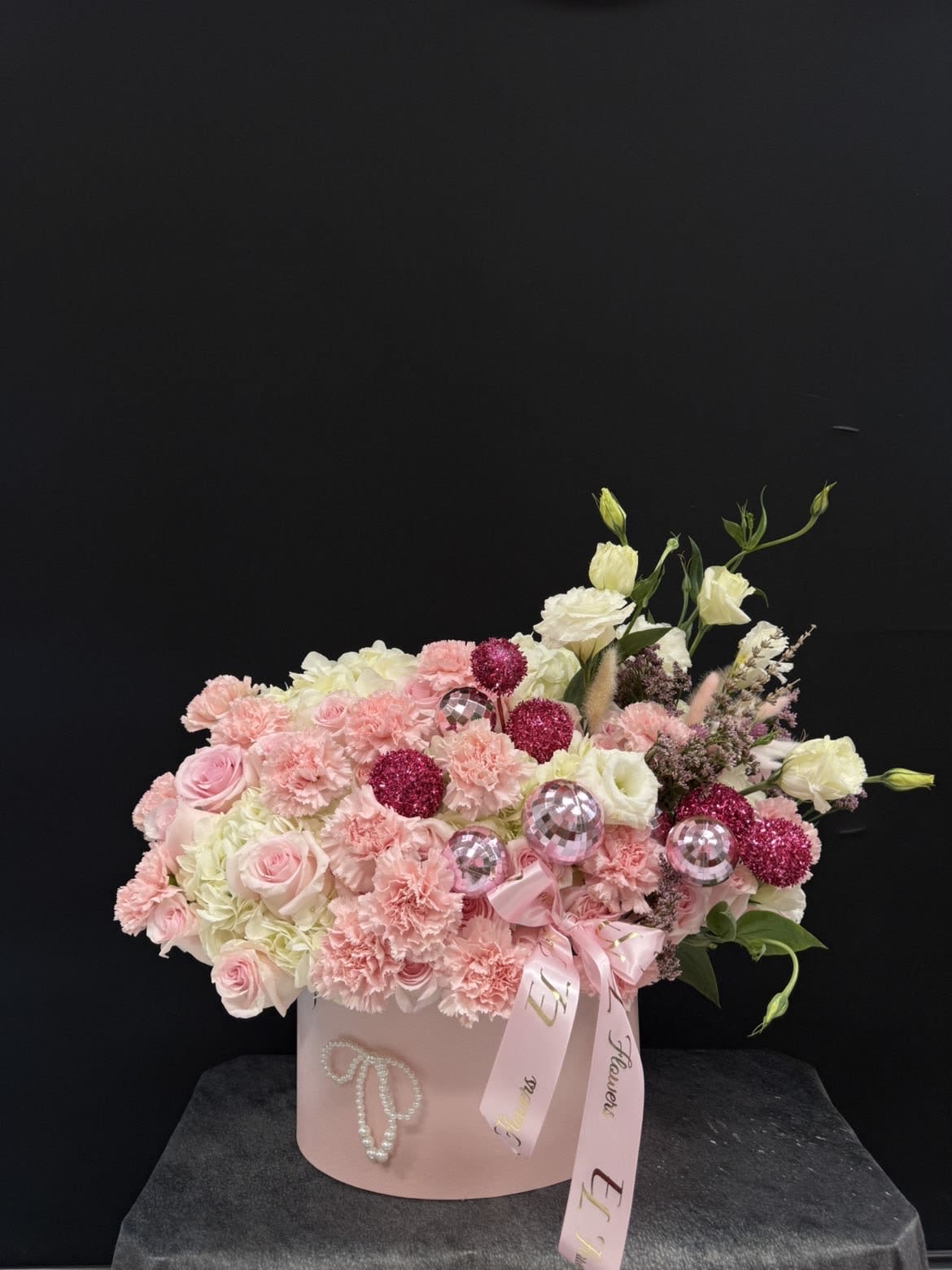 Pink Dream Luxury Christmas Box - A romantic luxury flower box filled with premium soft-pink roses, hydrangeas, carnations, lisianthus and accent florals, beautifully styled with sparkly decorative balls, pearls and signature EL Flowers ribbon. Perfect for birthdays, anniversaries, baby showers, brides, or anyone who deserves something truly special. 