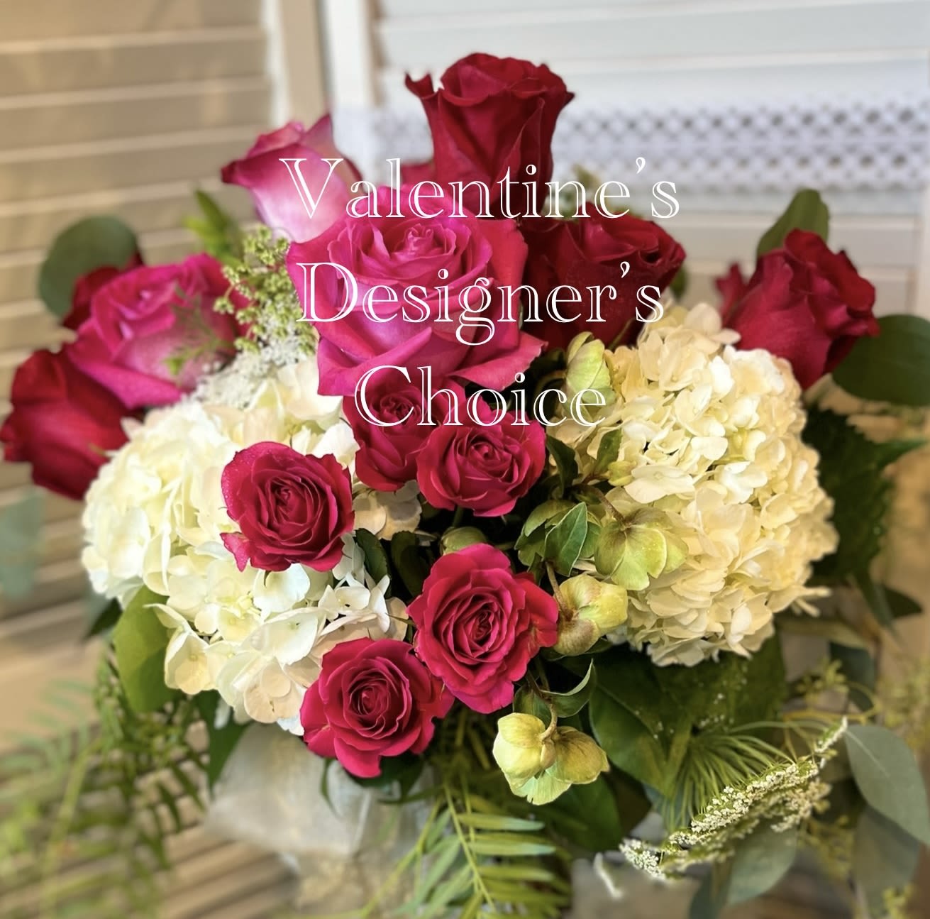 Bouquet of pink roses and white hydrangeas with greenery