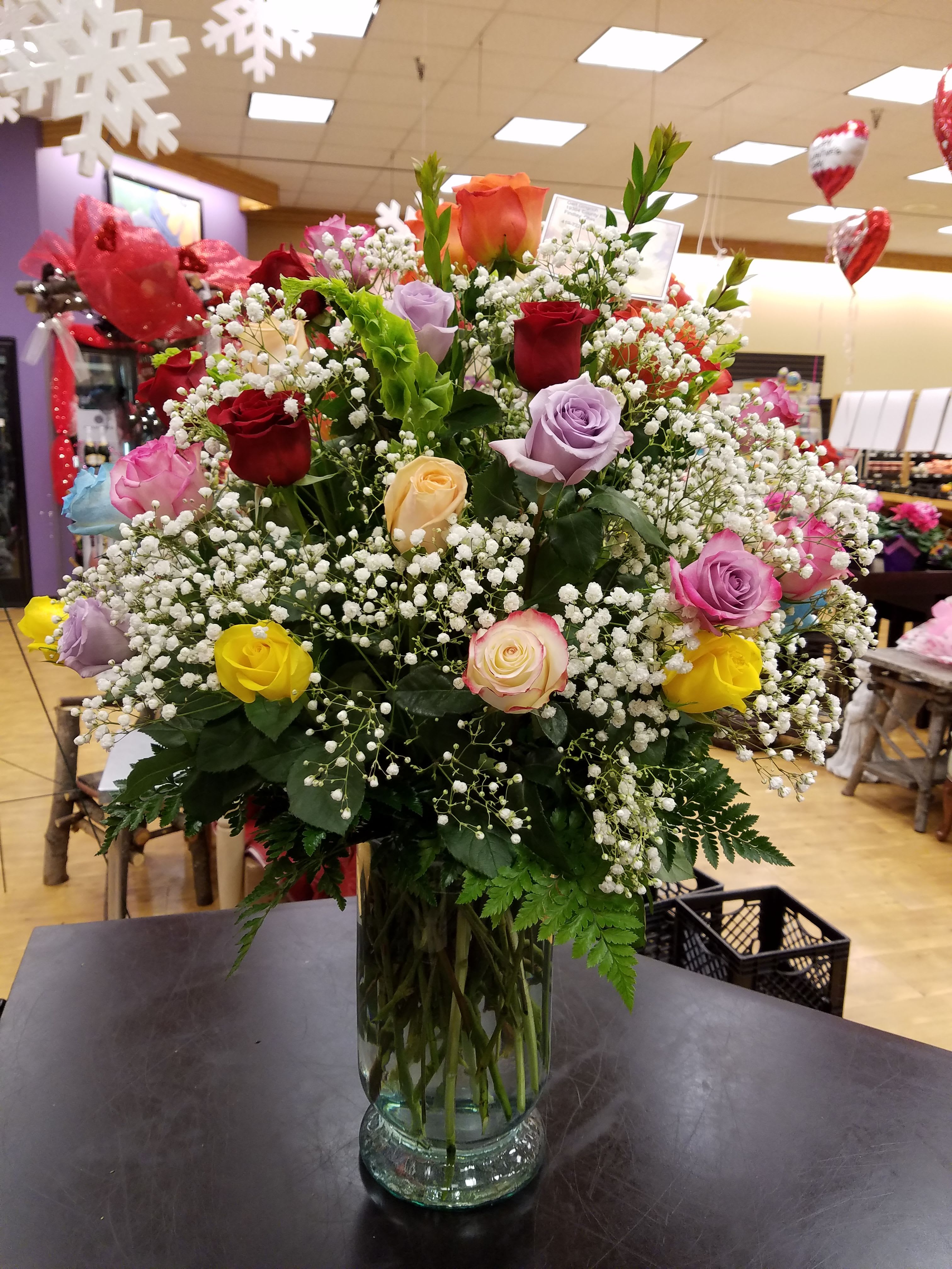 Rose bouquet - 4 dozen assorted color roses arranged with greenery and babies breath. - Ottawa Florist