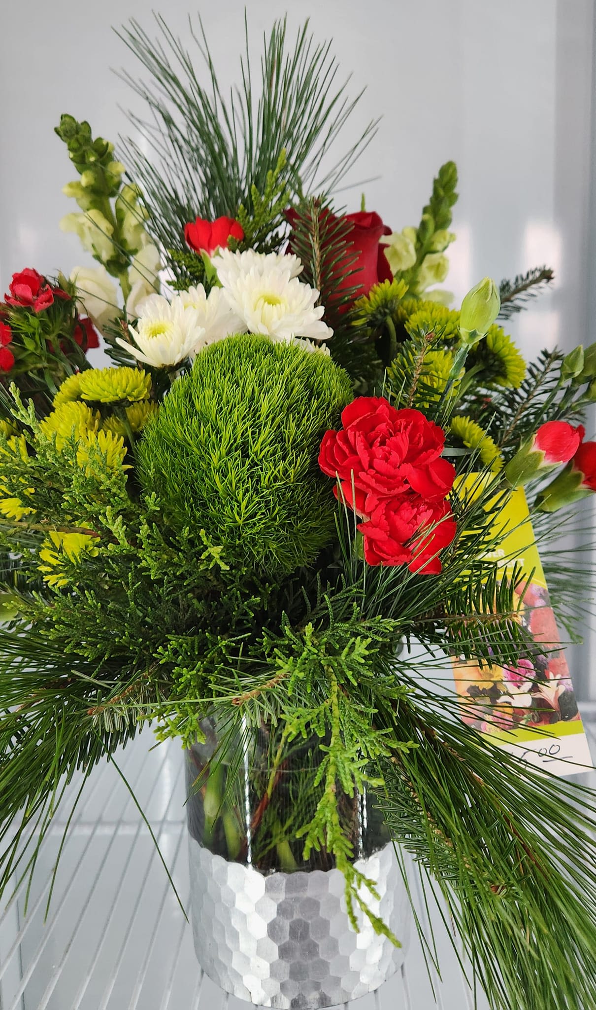 Happy Holiday  - Traditional vase arrangement with carnations, roses, mum and evergreens. - Ottawa Florist