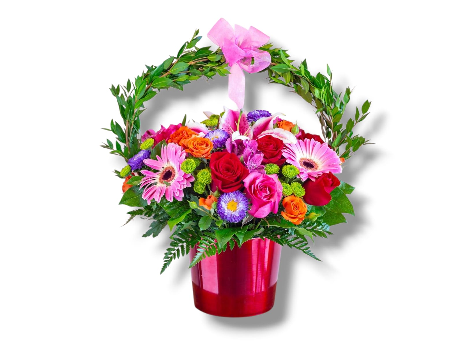 Mixed bouquet in a red vase with a pink ribbon handle
