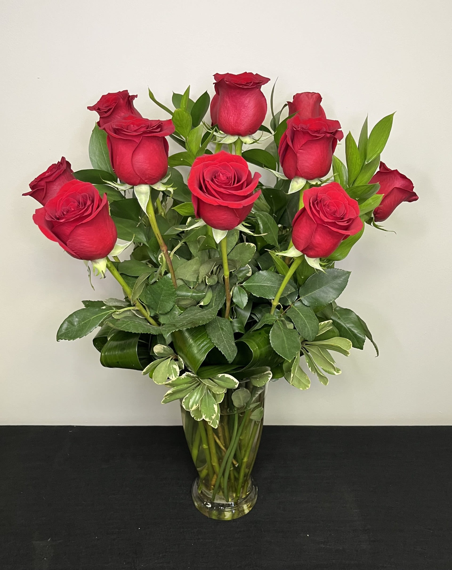 Dozen Long Stemmed Red Roses by Chasing Petals - These dozen red roses are the classic romantic gift! Perfect for Valentine's Day or an Anniversary. 