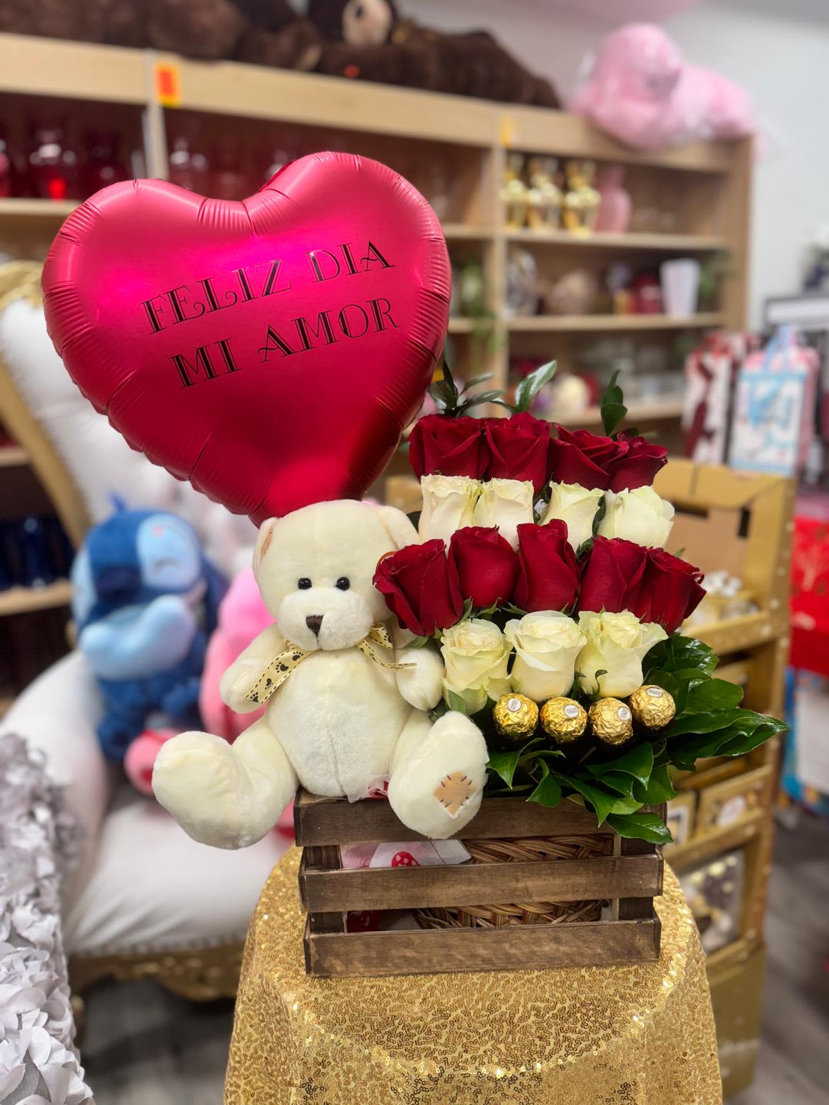 Feliz Dia mi amor - Combo Conquista Rosa, Sorprende con un encantadoras canasta de rosas rosadas, acompañado de un globo , un adorable peluche y exquisitos chocolates Ferrero Rocher. El regalo perfecto para expresar tu cariño.
