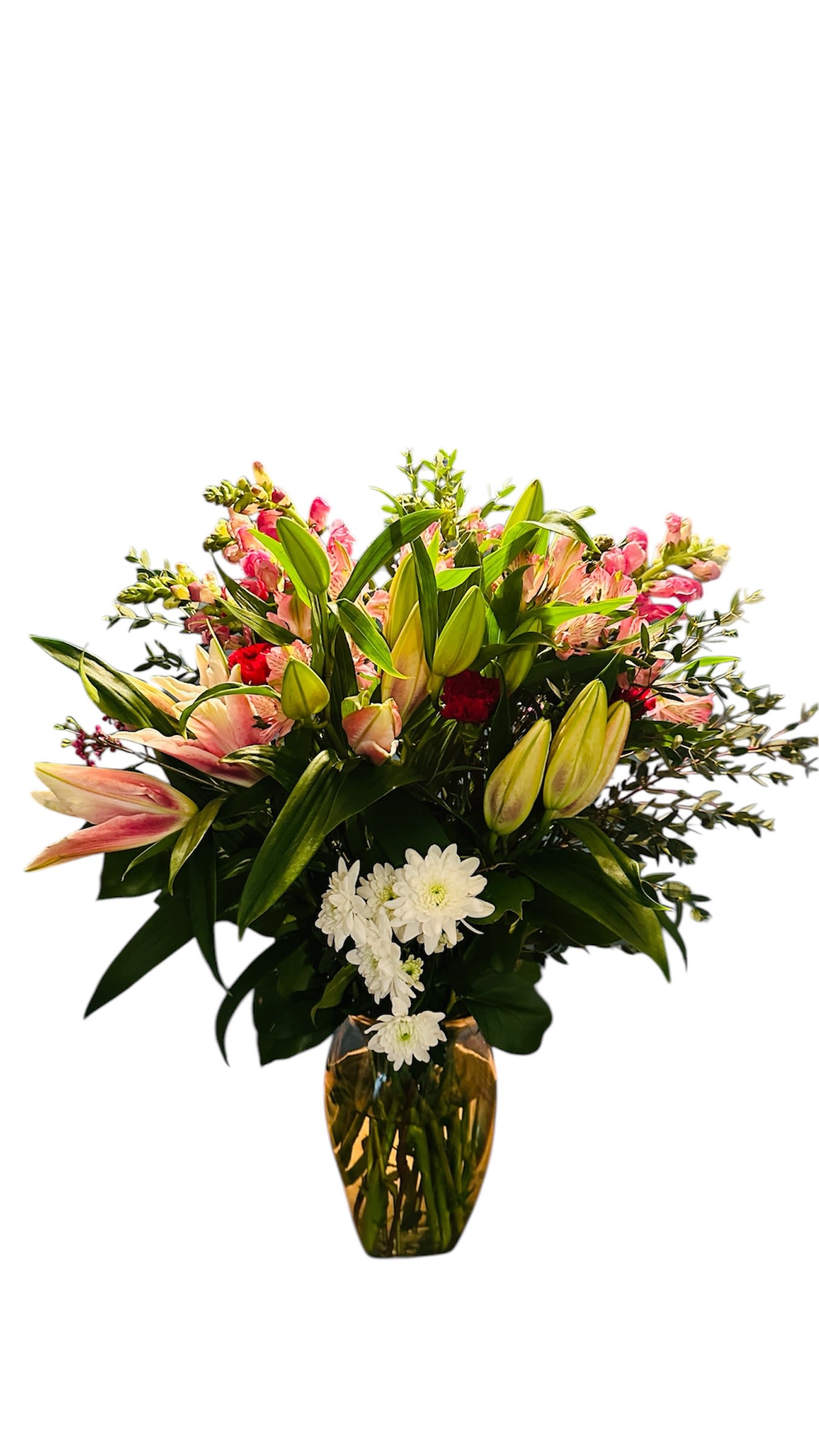 Bouquet of pink lilies, red flowers, and white daisies in a glass vase
