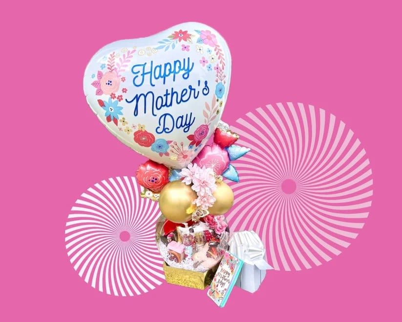 Mother's Day balloon bouquet with gift items on a pink background