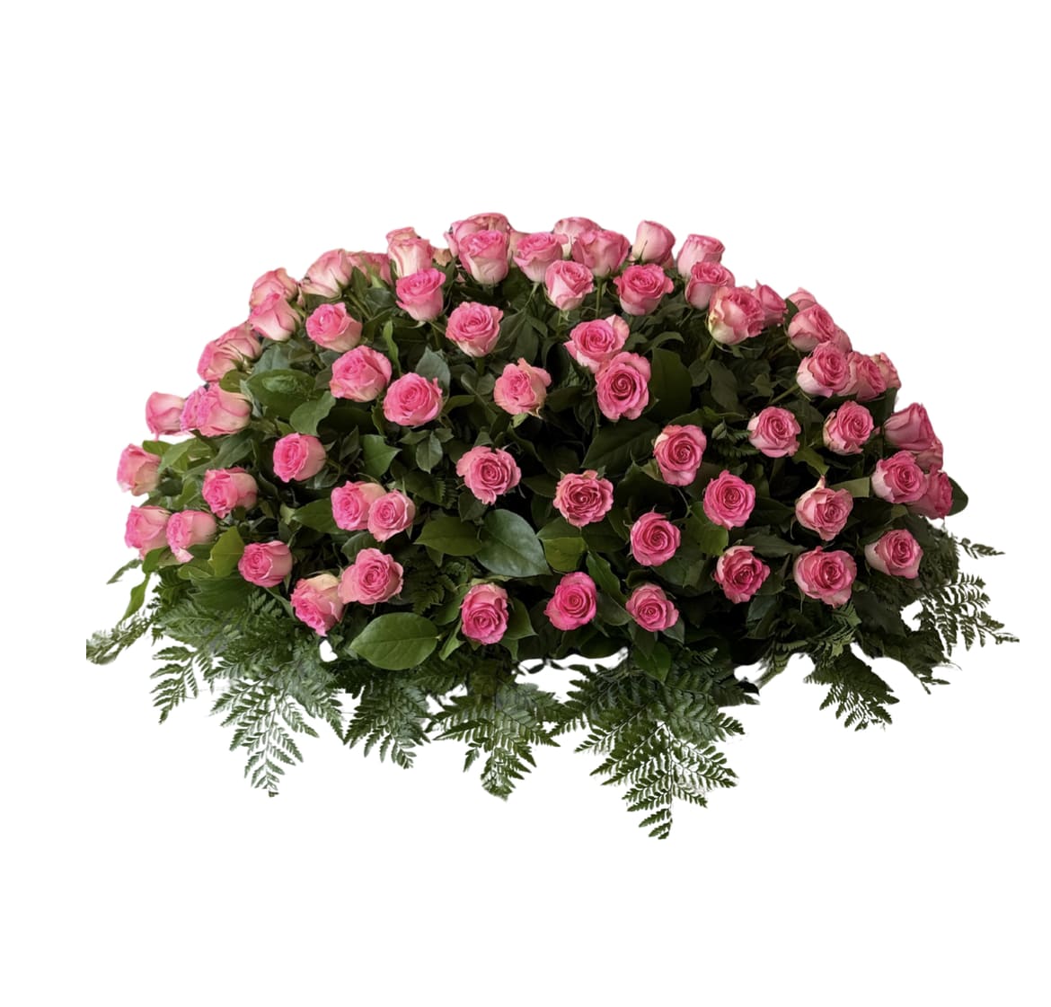 Large dome-shaped spray of pink roses with a border of ferns