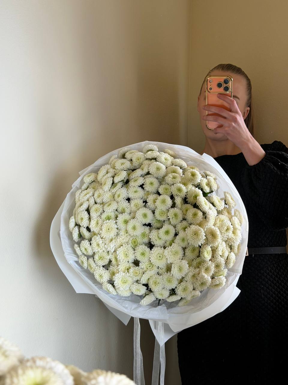 Momoko Silence -  The Momoko Silence bouquet is a reflection of purity, softness, and quiet elegance. Featuring perfectly round white Momoko chrysanthemums, this arrangement embodies balance and simplicity — nothing excessive, only light, shape, and air.  Each bloom forms a delicate sphere, symbolizing harmony, completeness, and calm confidence. This bouquet doesn’t speak loudly; it expresses feelings in a subtle and refined way. It’s about emotions that don’t need to be explained — only felt.  Momoko is a choice for those who appreciate minimalism with meaning. It’s perfect for expressing gratitude, sincere love, new beginnings, or simply creating a peaceful atmosphere in any space. The white color represents honesty and pure intention, while the rounded texture adds warmth and softness.  Elegant and timeless, Momoko Silence blends beautifully into any interior and remains fresh, structured, and graceful day after day.  Momoko Silence — when beauty speaks in a whisper.  If you’d like, I can also create:  • a more romantic version  • a luxury / high-end editorial style version  • a shorter product-card description  • or a few alternative name options 