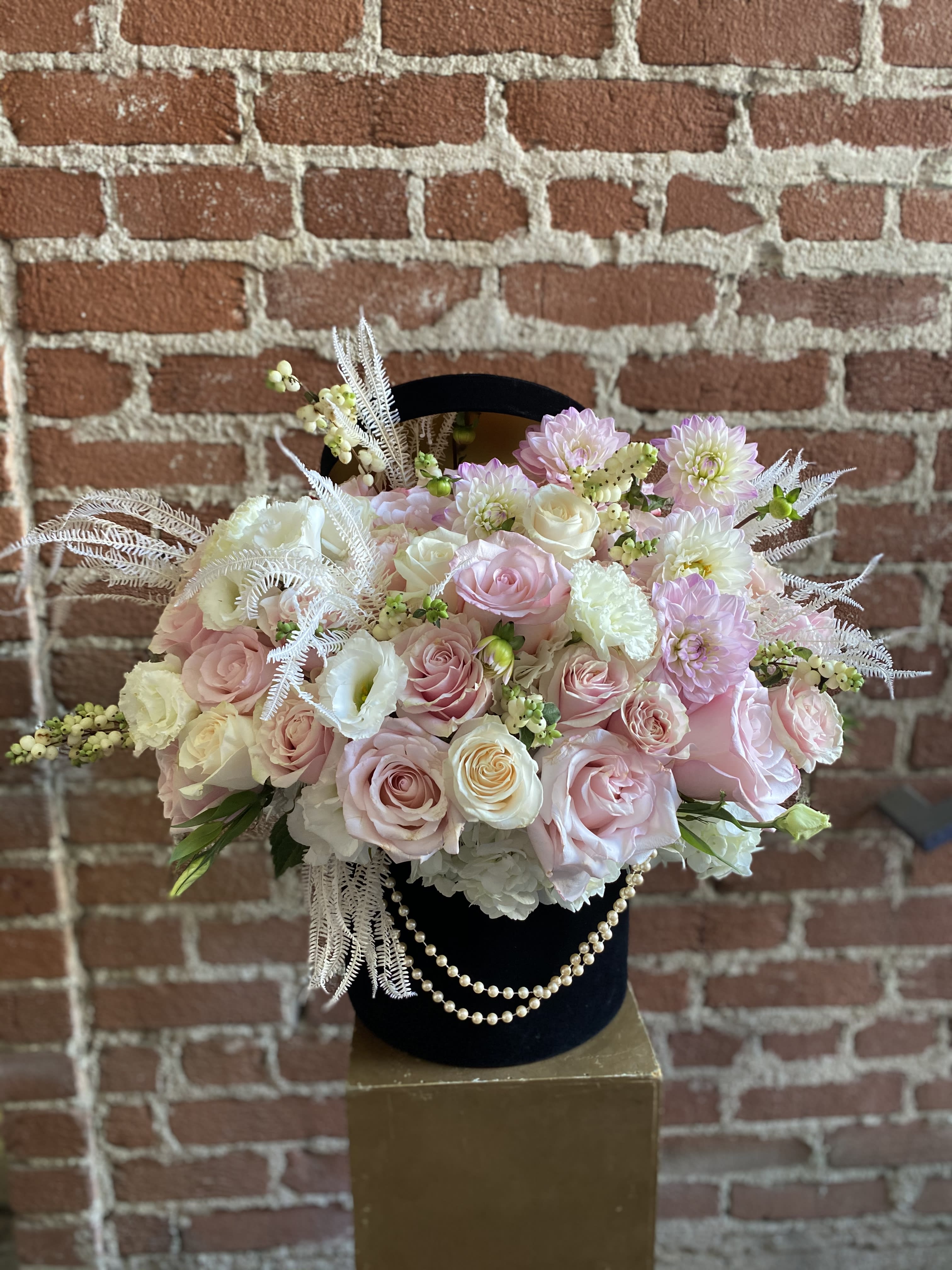 Midnight Dreams -  Santa Clarita Valley Florist - This beautiful arrangement is designed to deliver happiness to a loved ones day. Filled with beautiful flowers and customized to perfection, this arrangement is a showstopper! If you want to turn heads then this is the arrangement for you!