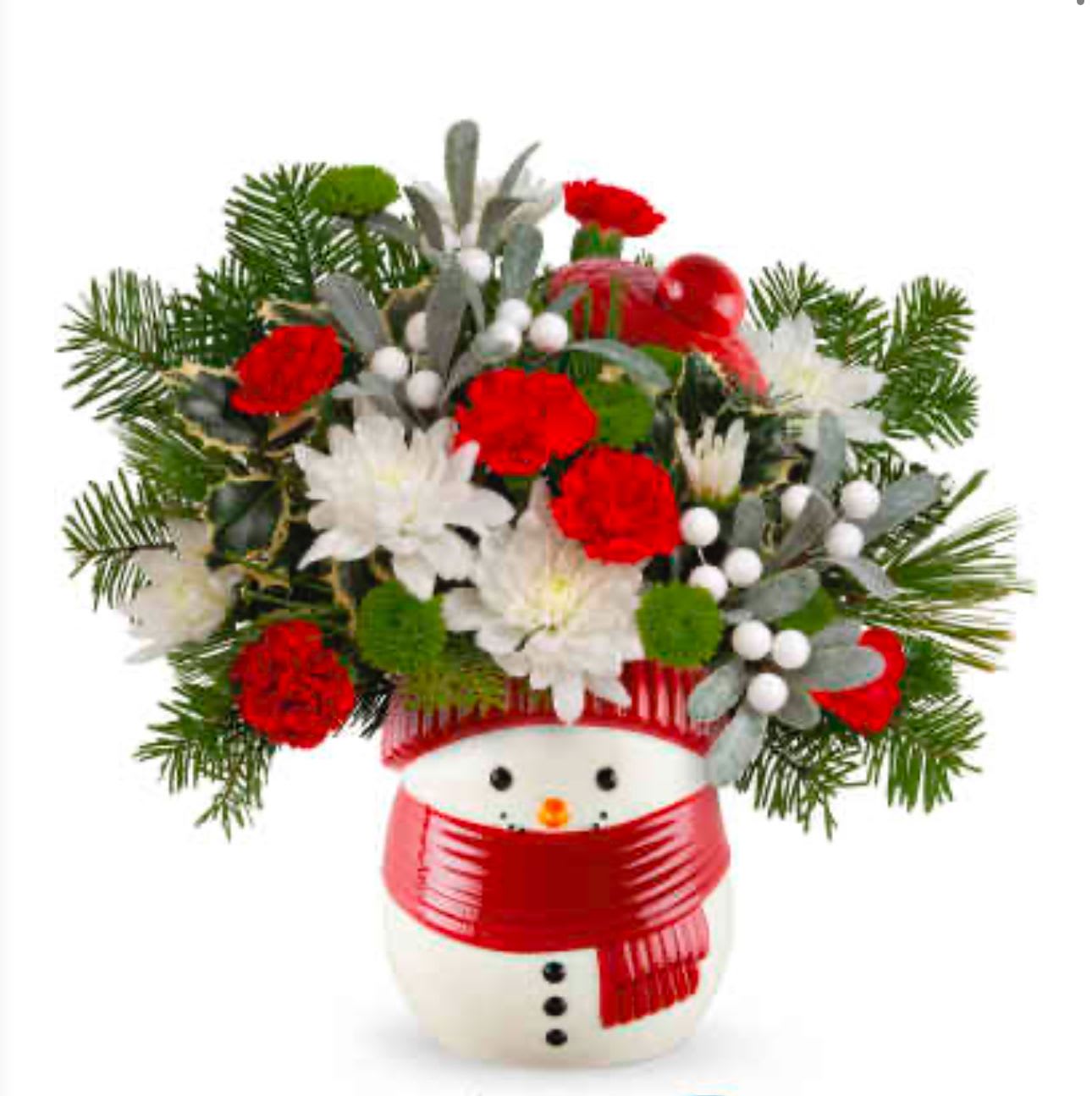 Christmas bouquet in a snowman vase with red and white flowers