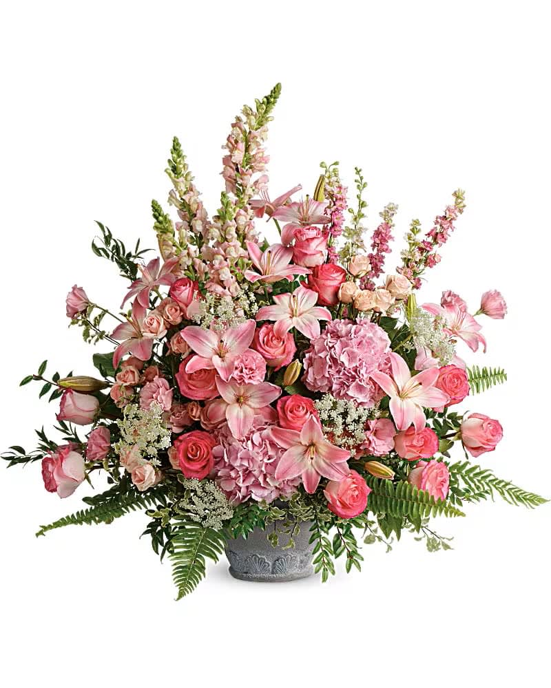 GRACEFUL GLORY BOUQUET - An exuberant celebration of a beautiful life, this glorious bouquet of pink hydrangea, roses and lilies adds feminine grace to the service. Light pink hydrangea, pink roses, light pink spray roses, light pink asiatic lilies, pink lisianthus, pink larkspur, light pink snapdragons, and Queen Anne's lace are arranged with Italian ruscus, huckleberry, pitta negra, sword fern, flat fern, and lemon leaf. Delivered in a Parisian Garden Pot.