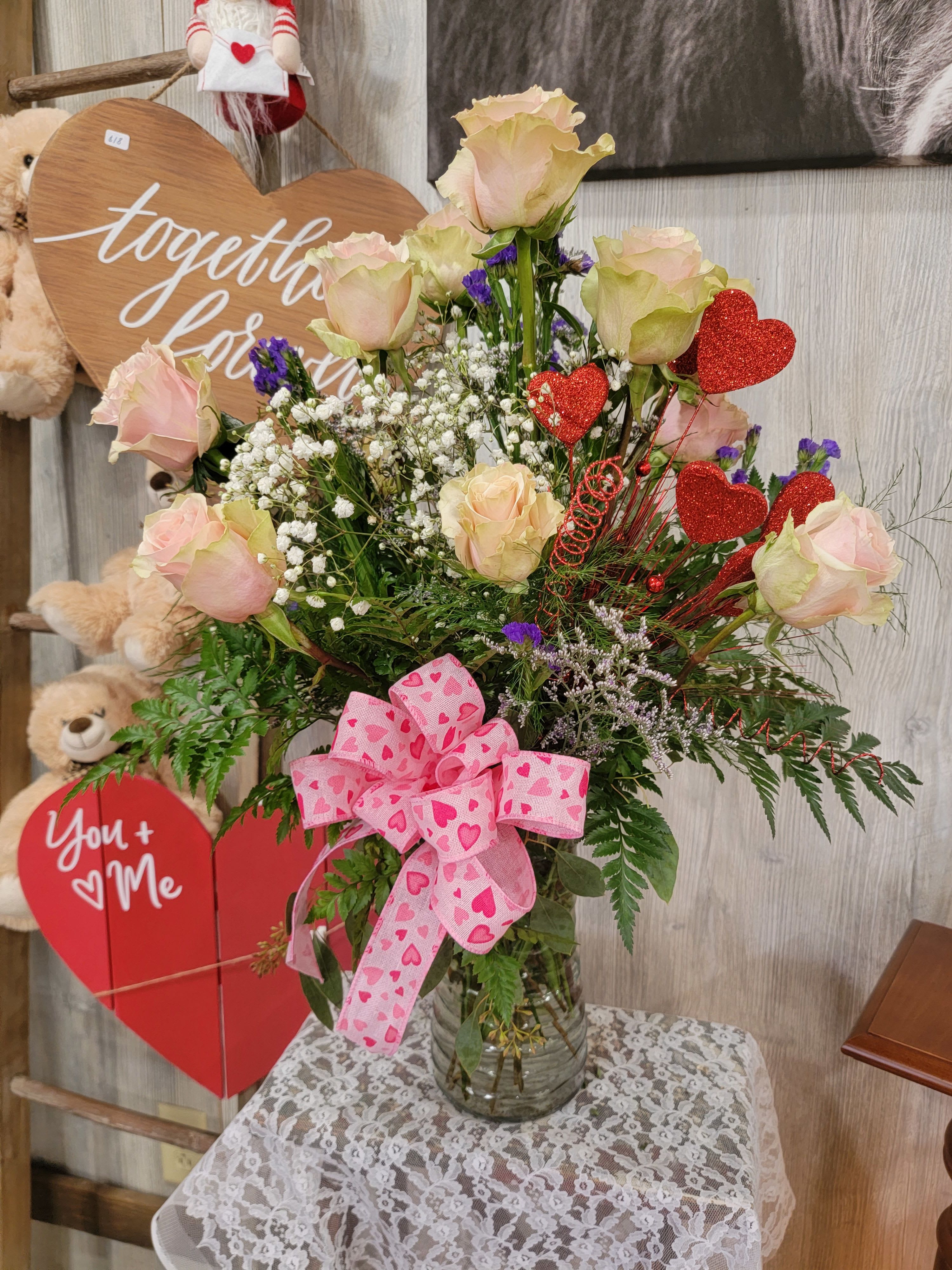 Dozen Pink Roses - A beautiful vase arranged with a dozen pink roses.
