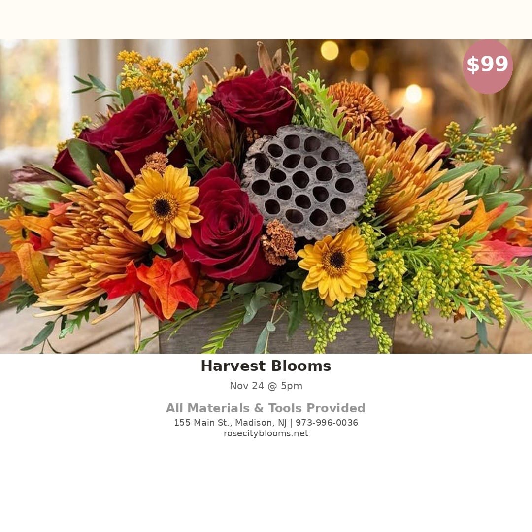 Autumn floral arrangement with red roses, yellow daisies, and orange mums