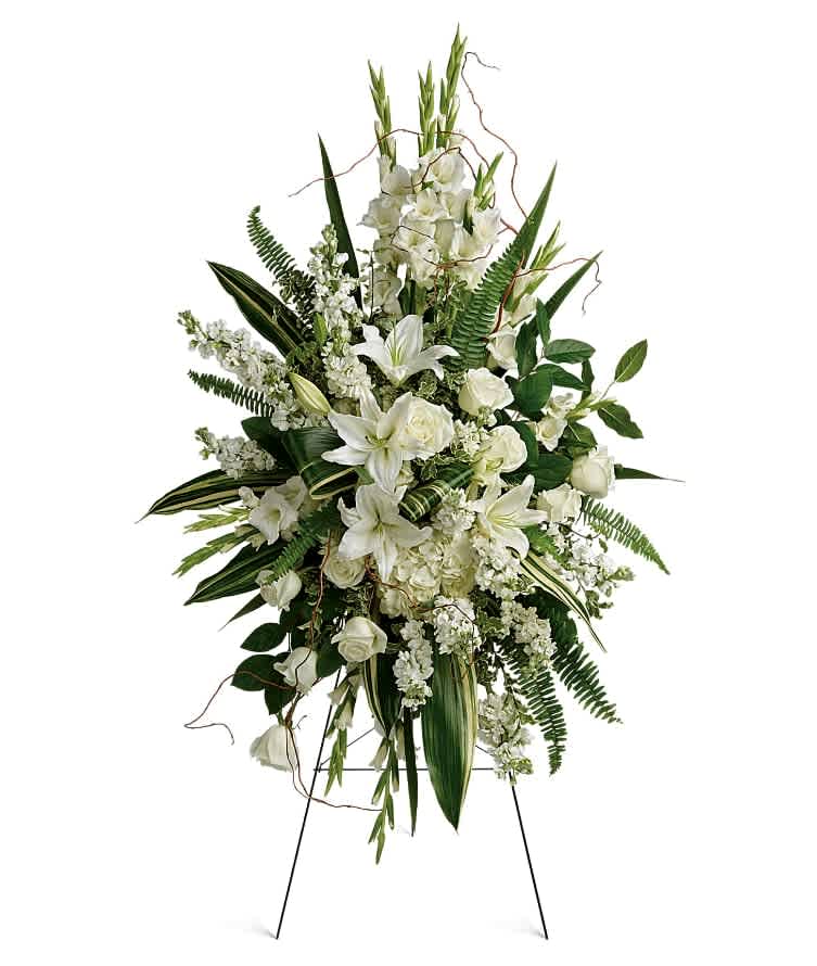 Heartfelt Sympathy Spray - This beautiful spray includes white hydrangea, white roses, white oriental lilies, white gladioli, white stock, pitta negra, sword fern, curly willow, variegated aspidistra leaves, and lemon leaf. Delivered on a wire easel. This beautiful spray includes white hydrangea, white roses, white oriental lilies, white gladioli, white stock, pitta negra, sword fern, curly willow, variegated aspidistra leaves, and lemon leaf. Delivered on a wire easel. Approximately 33 1/2" W x 52" H